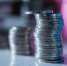 bottles-of-cash-with-coins-in-saving-money-concept - News102.Ru