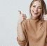 portrait-of-fair-haired-beautiful-female-woman-with-broad-smile-and-thumbs-up - News102.Ru