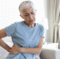 unhealthy-mature-woman-holding-belly-feeling-discomfort-health-problem-concept-unhappy-older-female-sitting-on-bed-suffering-from-stomachache-food-poisoning-gastritis-abdominal-pain-climax - News102.Ru