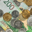 money-coins-and-banknotes-in-russian-rubles-scattered-in-a-heap-on-the-table-top-view-idea-for-background-or-banner-for-market-news (1) - News102.Ru