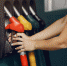elegant-woman-standing-on-a-gas-station - News102.Ru