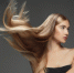 beautiful-model-with-long-smooth-flying-blonde-hair-isolated-on-dark-grey-studio-background-young-caucasian-model-with-well-kept-skin-and-hair-blowing-on-air - News102.Ru