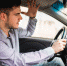 side-view-of-angry-man-in-casual-wear-driving-car - News102.Ru