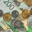 money-coins-and-banknotes-in-russian-rubles-scattered-in-a-heap-on-the-table-top-view-idea-for-background-or-banner-for-market-news - News102.Ru