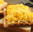 delicious-breakfast-with-scrambled-eggs-toasted-bread-served-wooden-board-closeup_495423-45386 - News102.Ru