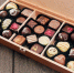 different-chocolate-candies-in-wooden-box - News102.Ru