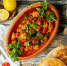 fried meat with vegetables top view - News102.Ru