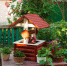 A nice backyard with an artificial well. - News102.Ru